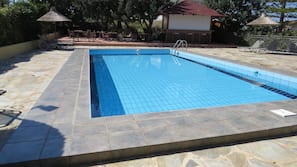 Seasonal outdoor pool, pool umbrellas, sun loungers