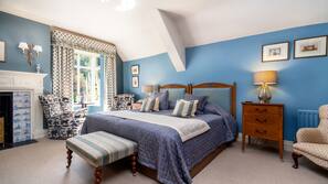 Minibar, desk, rollaway beds, linens