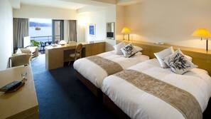 Free minibar items, in-room safe, desk, laptop workspace
