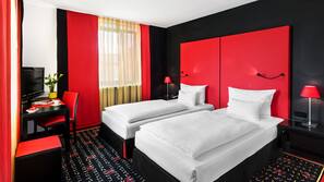 Hypo-allergenic bedding, down comforters, minibar, in-room safe