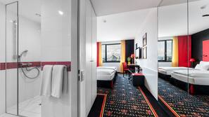 Hypo-allergenic bedding, down comforters, minibar, in-room safe