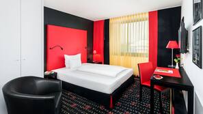 Hypo-allergenic bedding, down comforters, minibar, in-room safe