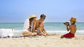 On the beach, beach towels