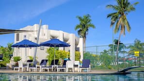 2 outdoor pools, pool umbrellas, pool loungers