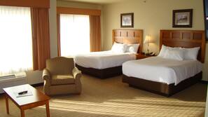 Pillowtop beds, desk, blackout drapes, iron/ironing board