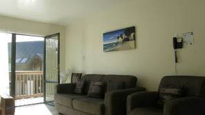 Blackout curtains, iron/ironing board, free WiFi, linens