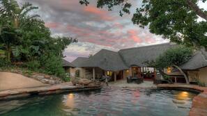 Outdoor pool, pool umbrellas, pool loungers