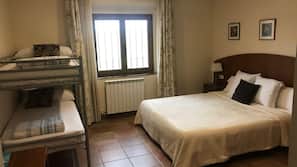 Desk, blackout curtains, free cots/infant beds, free WiFi