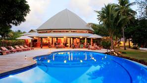 Outdoor pool, open 7:00 AM to 9:00 PM, pool umbrellas, pool loungers