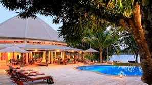 Outdoor pool, open 7:00 AM to 9:00 PM, pool umbrellas, pool loungers