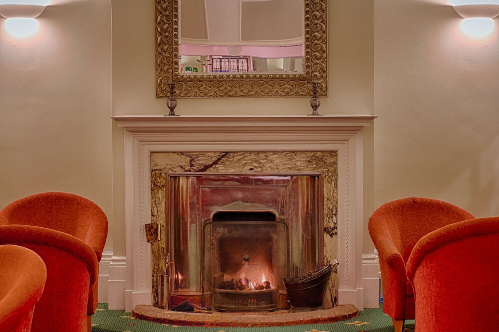 Fireplace, Luccombe Hall Country House Hotel