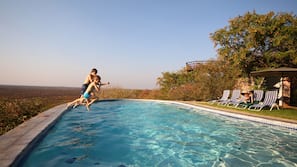 2 outdoor pools, pool umbrellas