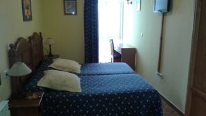 Premium bedding, blackout curtains, rollaway beds, free WiFi