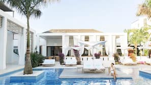 Outdoor pool, pool umbrellas, pool loungers