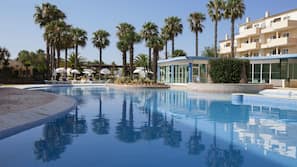 2 outdoor pools, pool umbrellas, pool loungers