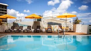 Outdoor pool, sun loungers