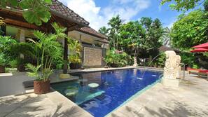 Outdoor pool, pool umbrellas, pool loungers