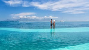 Outdoor pool, open 6:00 AM to 8:00 PM, pool umbrellas, sun loungers