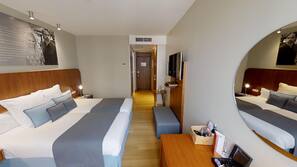 Free minibar items, in-room safe, individually decorated, desk