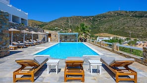 Seasonal outdoor pool, pool umbrellas, sun loungers