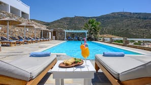 Seasonal outdoor pool, pool umbrellas, sun loungers