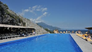 Outdoor pool, open 8:00 AM to 6:30 PM, pool umbrellas, sun loungers