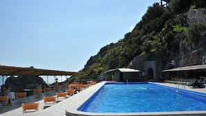 Outdoor pool, open 8:00 AM to 6:30 PM, pool umbrellas, sun loungers