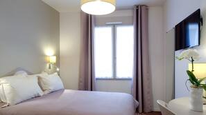 Premium bedding, free minibar, in-room safe, desk