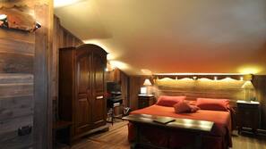 Minibar, coffre-forts dans les chambres, bureau, rideaux occultants