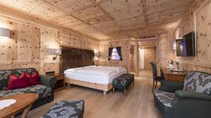 Premium bedding, down comforters, pillowtop beds, minibar