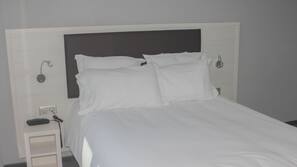 Premium bedding, down comforters, in-room safe, desk