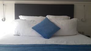 Premium bedding, down comforters, in-room safe, desk