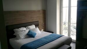 Premium bedding, down comforters, in-room safe, desk