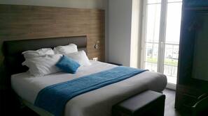 Premium bedding, down comforters, in-room safe, desk