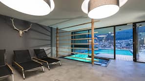 Indoor pool, outdoor pool, pool umbrellas, sun loungers