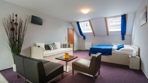 Een minibar, een kluis op de kamer, een bureau, gratis wifi