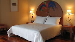 Ropa de cama de alta calidad, minibar, caja fuerte y escritorio