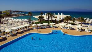 Indoor pool, seasonal outdoor pool, pool umbrellas, sun loungers