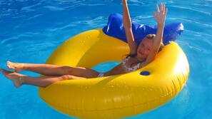 Outdoor pool, pool umbrellas, sun loungers