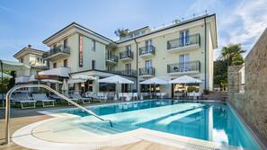 2 outdoor pools, pool umbrellas, pool loungers