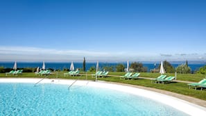 Indoor pool, 2 outdoor pools, open 8 AM to 8 PM, pool umbrellas