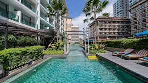 Outdoor pool, pool umbrellas, sun loungers
