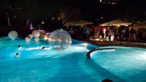 Seasonal outdoor pool, pool umbrellas, pool loungers