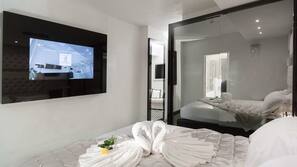 Lenzuola Frette, minibar, cassaforte in camera, una scrivania