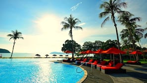 Indoor pool, outdoor pool, pool umbrellas