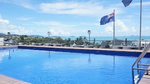 Outdoor pool, pool umbrellas, pool loungers