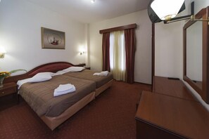 Minibar, in-room safe, iron/ironing board, free cribs/infant beds