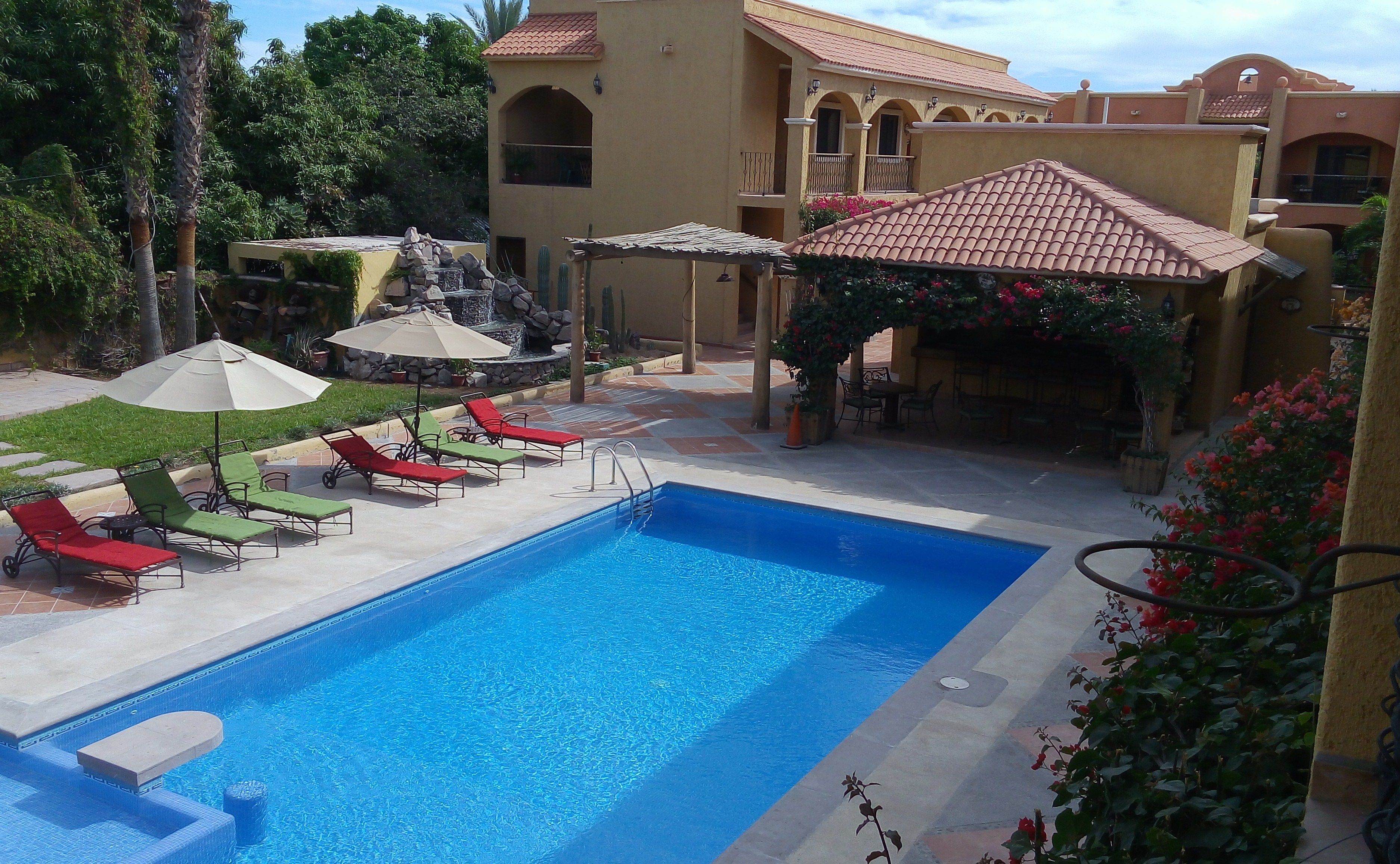 loreto hacienda suites pool loungers umbrellas sun outdoor