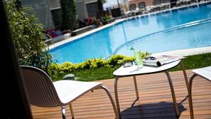 Outdoor pool, pool umbrellas, pool loungers
