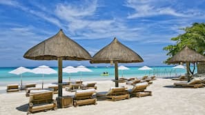 Private beach, white sand, sun-loungers, beach umbrellas
